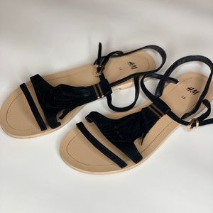 Black sandal; H&M; size 8 with gold buckle.